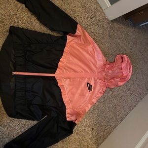 Size M pink and black wind breaker